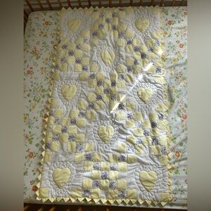 Vintage embroidered handmade crib quilt with prairie points border